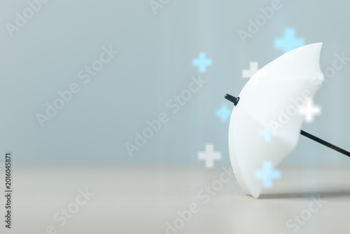 Tableau sur toile White umbrella symbolizes health insurance protection, medical coverage and financial security for healthcare expenses