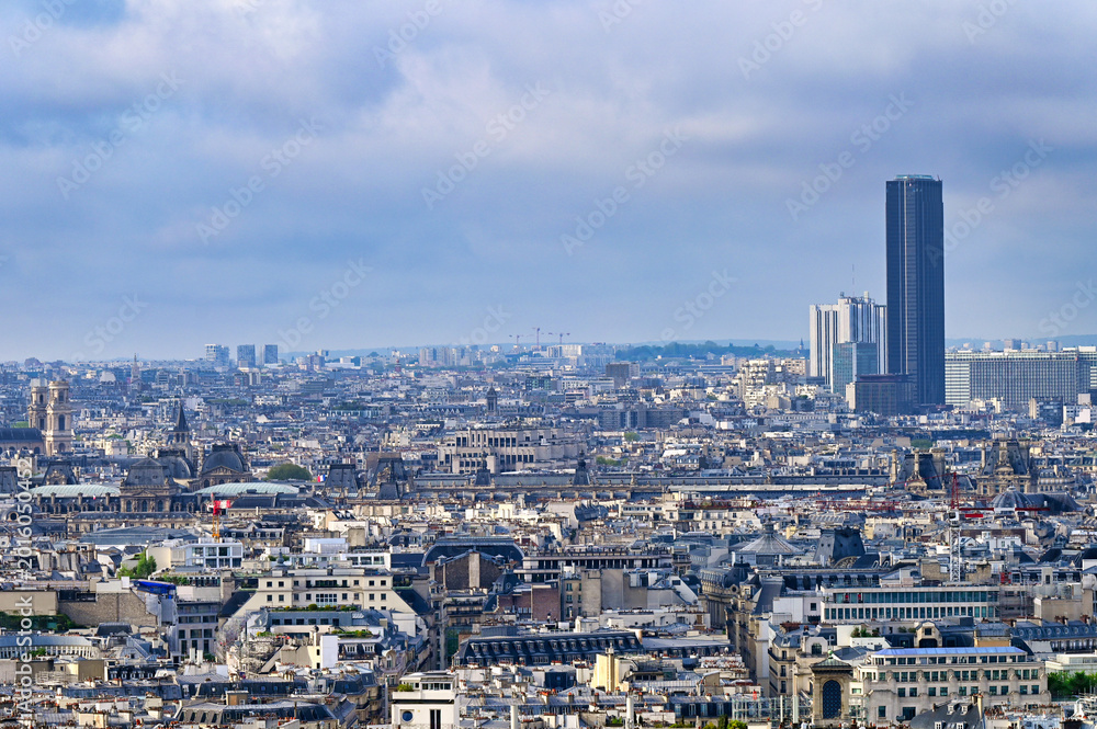 Obraz premium Panoramic view of Paris skyline with Tour Montparnasse and Saint-Sulpice church from Montmartre