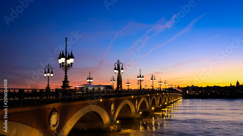 Canvas Print The landscape View of the Pont de pierre with sunset sky scene which The Pont de