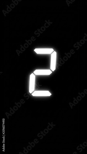 Digital display of number six against a black background