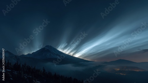 Majestic Mountain Under Celestial Light Beams
