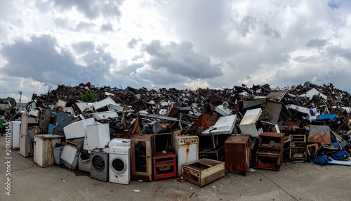 Discarded appliances pile symbolizing recycling, waste management, sustainability