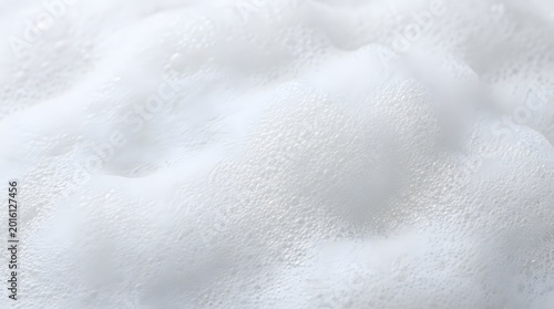 Close-up of white foam texture with soft bubbles