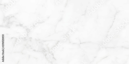 Photos A pristine marble texture with subtle veining, embodying elegance and sophistication, offers a versatile backdrop for design and visual projects