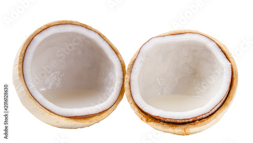 Фотография Two halves of a fresh young coconut with clear water, isolated on transparent ba