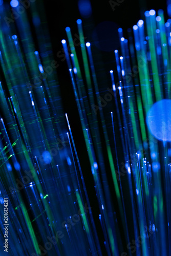 Glowing Fiber Optic Network Background in Blue and Green Colors