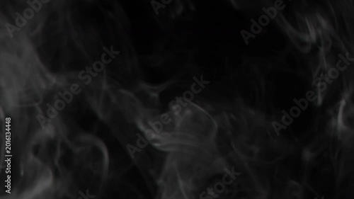 Realistic white smoke or steam rising slowly and billowing against a black background for special effects or overlay.