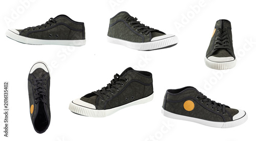 Casual sneakers isolated on white background, canvas shoes set in different angles. File contains clipping path