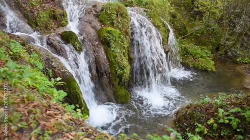 Waterfall on Gostilje creek in village Gostilje in southern Serbia near mountain Zlatibor, famous tourist destination