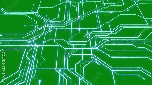 Electronic circuit board with green background.