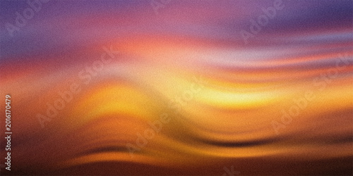 Fotografie Abstract sunset background featuring warm golden orange and purple waves with a grainy texture for artistic visual projects