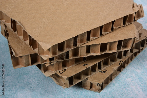 The honeycomb cardboard on blue background