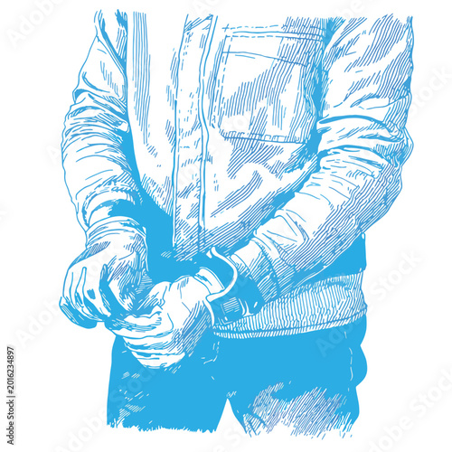 Man wearing handcuffs on wrists.