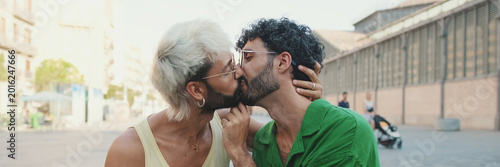 Obraz na plátně Homosexual couple kissing each other. Panoramic