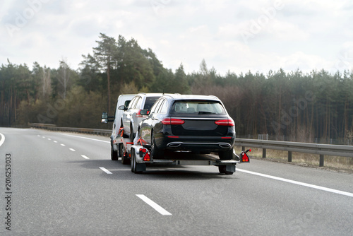 Emergency towing service hauling broken down vehicle
