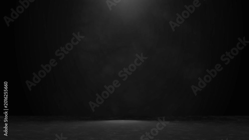 The studio background is black with smoky light.