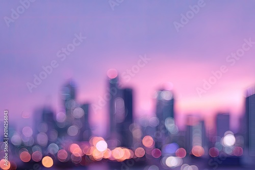 Blurred Cityscape at Dusk with Purple and Pink Hues.