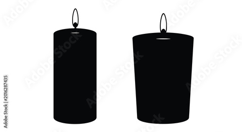 Foto Two black pillar candles with wicks isolated on a white background silhouette