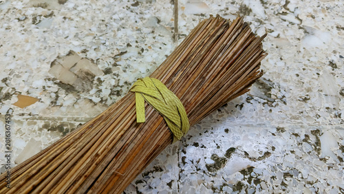 Obraz na plátně Traditional Indonesian brooms are made from coconut leaf bones.