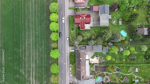 Aerial Top View of Rural Residential Area Along Country Road