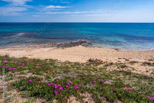 Tableau sur toile The Spiaggia della Madonnina Beach view in Maruggio Town (near Taranto, Puglia)