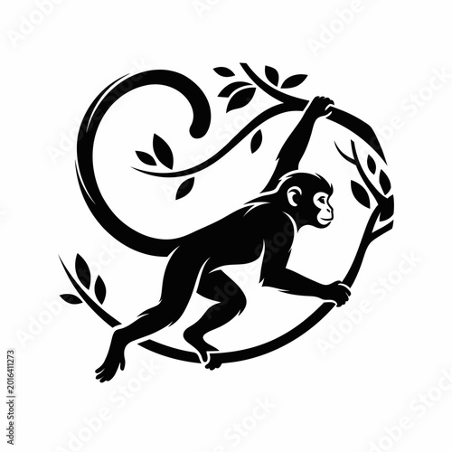 Canvas Print monkey hanging from a tree branch.