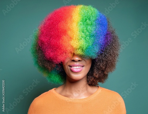 funny multicolor abstract afro hair woman portrait isolated on one color background. artistic image.