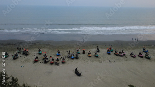 Traditional Wooden Fishermen's fishing boat, Teknaf Coxs bazar, Bangladesh. Colorful Wooden Fishing Boat On a Cox's Bazar Sea Beach With Sunny Day Background in Bangladesh. Beautiful Bangladesh Photo.