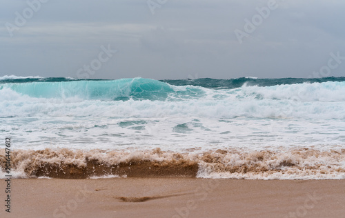 Photography Waves Crash on Shore During Cloudy Day at Ocean
