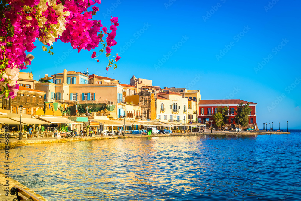 Obraz premium venetian habour of Chania with historical houses at sunny day, Crete, Greece