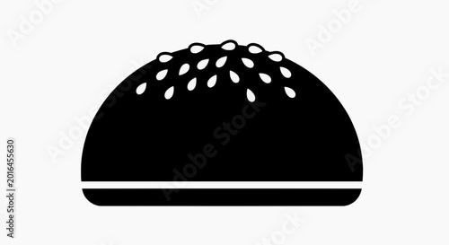Stylized black and white illustration of a round food item with small seeds on top, resembling a bun or pastry, set against a plain background
