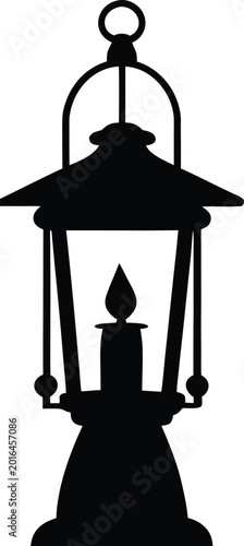 Lantern portable glass and metal light source silhouette.