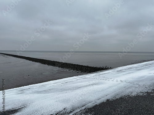 Foto Wadden Sea mudflats during low tide in Norddeich, Germany