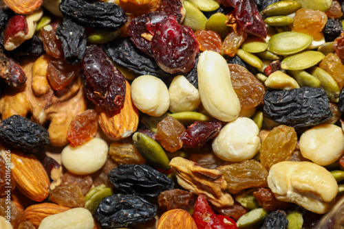 Photos A colorful mix of healthy nuts, dried fruits, and seeds creates an appetizing texture for healthy eating