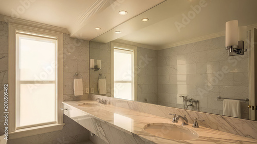 Modern bathroom interior with double sink vanity and large mirror