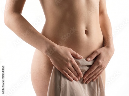 Schilderij op canvas female torso hands covering lower abdomen with beige cloth intimate health body