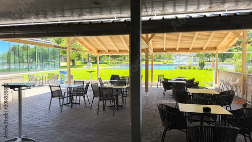 Modern outdoor swimming pool and summer poolside terrace during seasonal opening at luxury resort hotel, contemporary leisure area with relaxation zone, premium hospitality business concept for summer