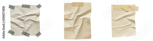Photos Three Sets of Crumpled Vintage Paper Sheets Taped with Duct Tape and Masking Tape, Representing Old Documents, Creative Textures, and Retro Stationery Concepts on a White Background