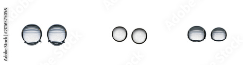 Konstfotografi Three Pairs of Clear Water Droplets Isolated on a White Background, Featuring Realistic Liquid Surface Tension, Reflective Shine, and Transparent Macro Textures for Pure Design Concepts