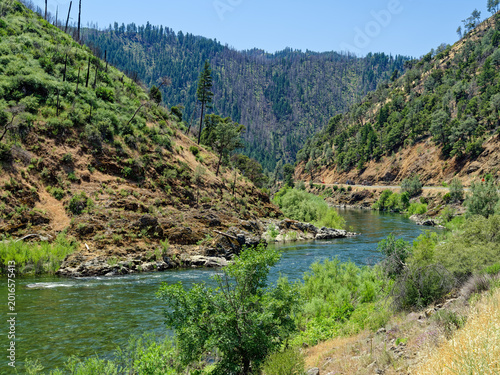 The Trinity River flows next to Highway 299 near Burnt Ranch, California, USA