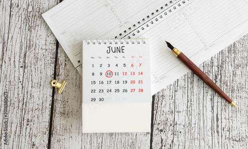 Wooden perpetual calendar showing the 10th of June