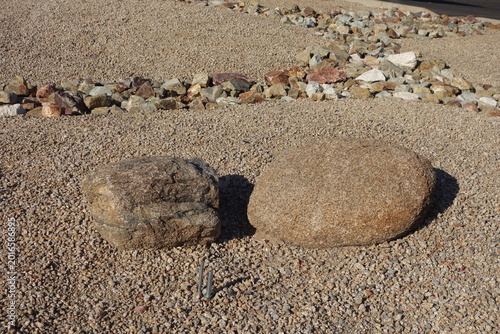 Photos Natural Granite Boulders Placed on a Bed of Fine Gravel