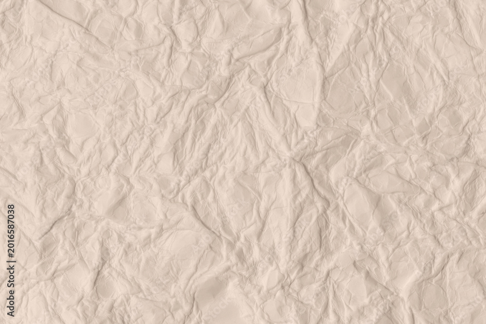 Fototapeta premium Minimalist high-quality macro of crumpled ivory paper with delicate creases and neutral shadows