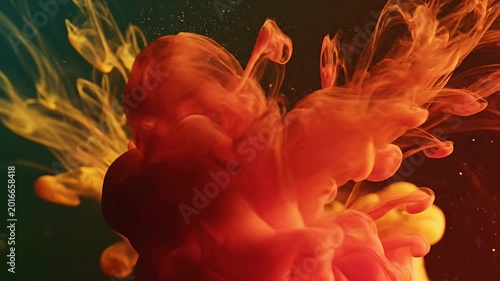 Abstract ink flow with vibrant colors in liquid environment