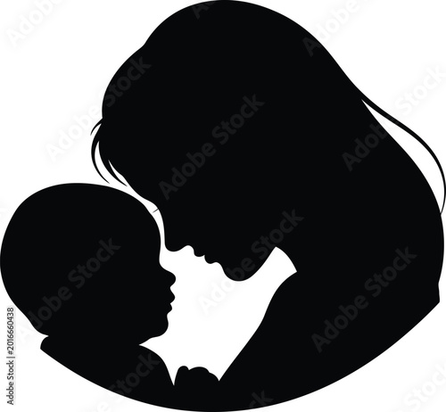 Black silhouette of mother kissing baby