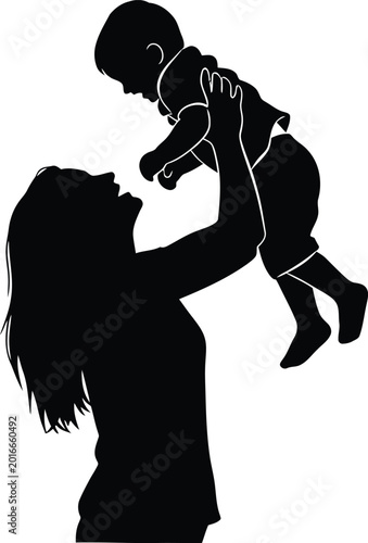 Black silhouette of woman lifting baby