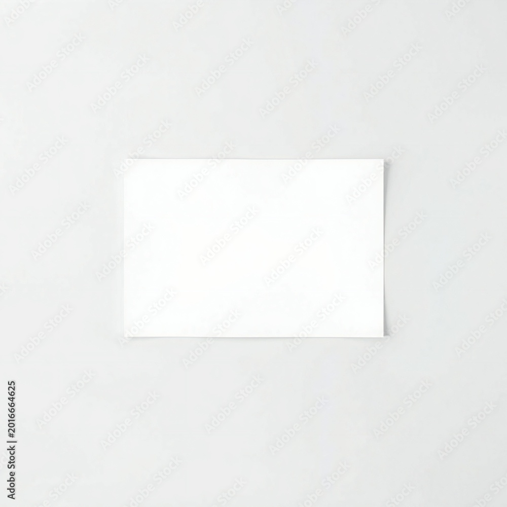 Fototapeta premium Blank white card on a light gray background with copy space
