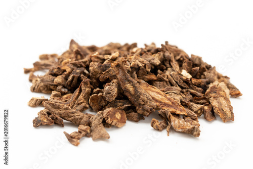 фотографія Chinese Hubei Produced Chinese Medicinal Material Duhuo White Background