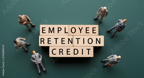 Employee Retention Credit Concept with Business People and Text Blocks.