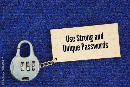Locks and wooden tags with the words Use Strong and Unique Passwords. creating complex, long, and distinct login credentials for every single online account to prevent unauthorized access